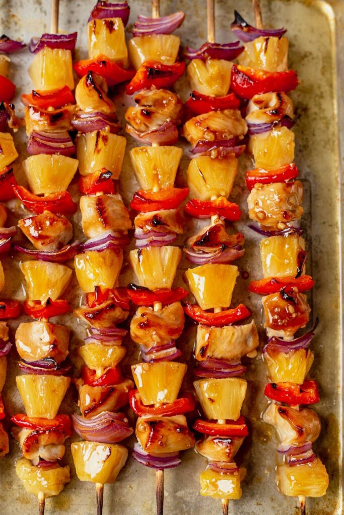 grilled skewers and corn on barbecue