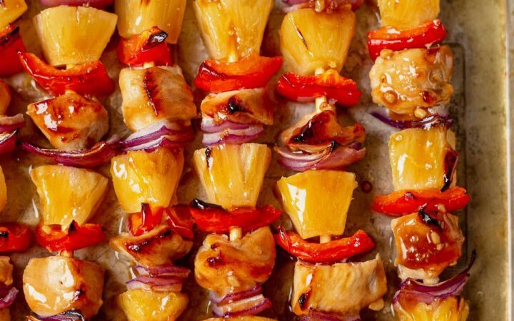 grilled skewers and corn on barbecue